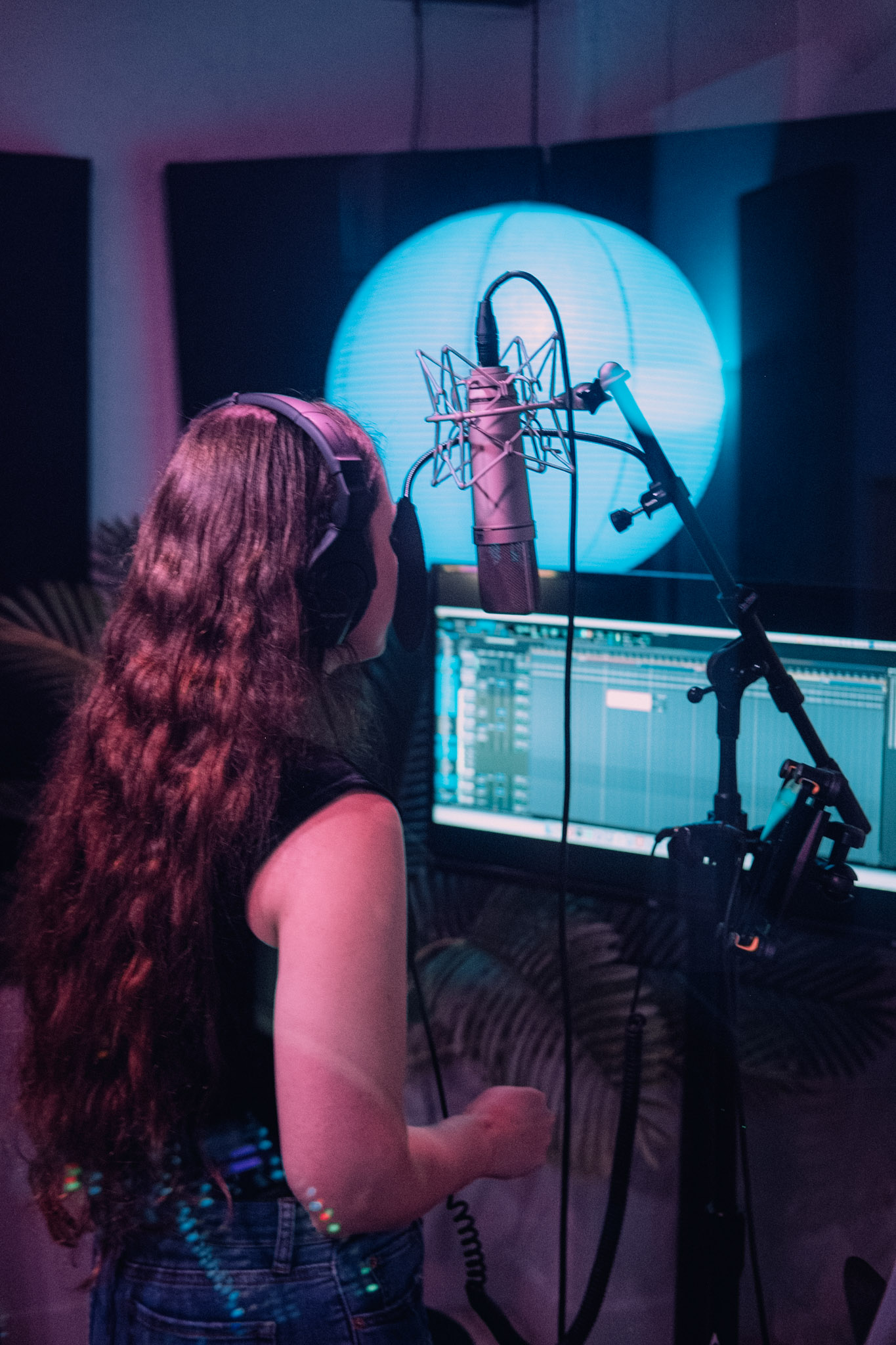 Artist recording in the booth