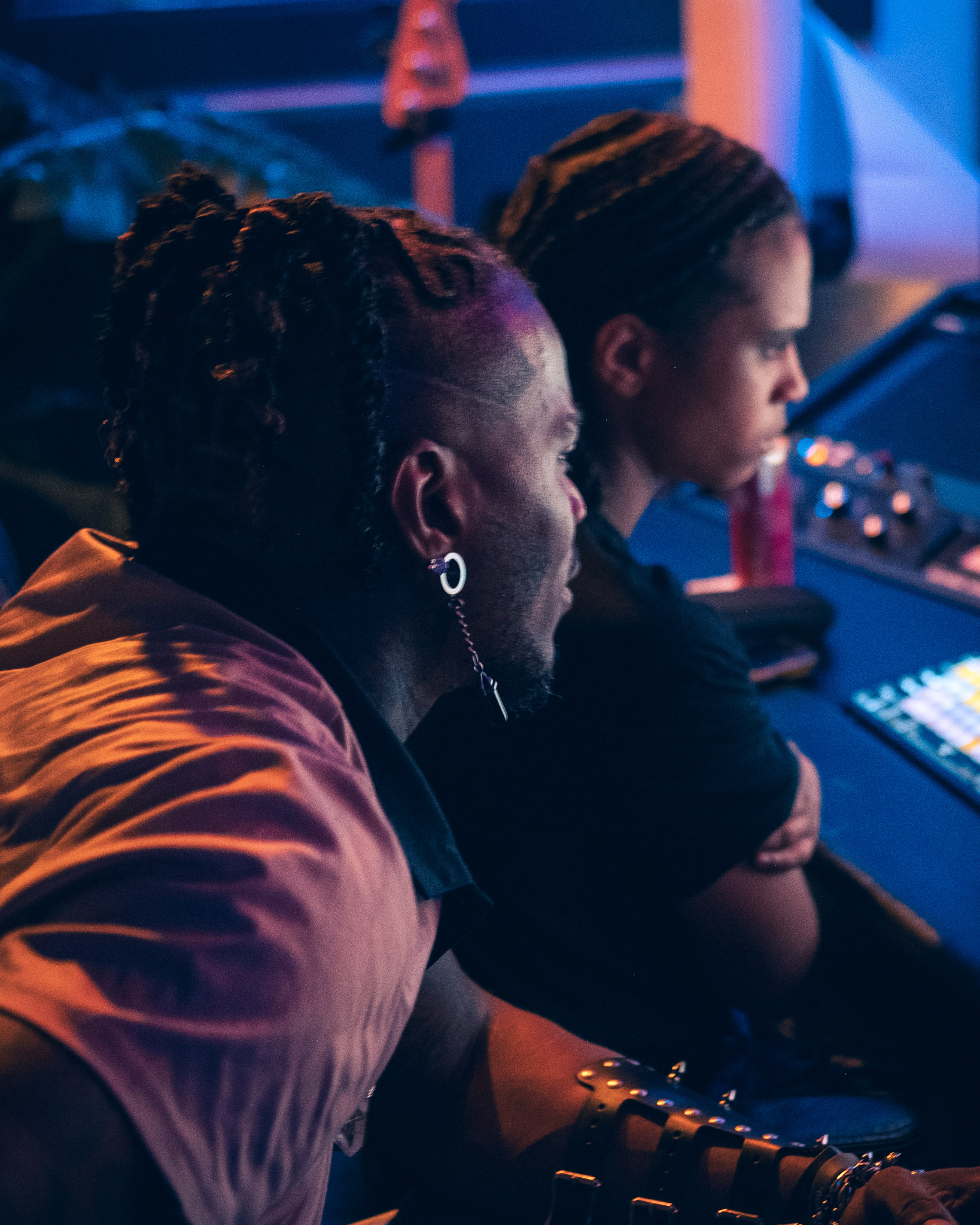 Jalissa at the console with an artist